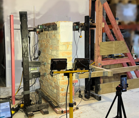 Experimental Testing of Seismically Retrofitted URM Parapets using Vertical Screw Reinforcing
