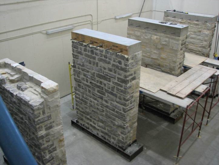 EVALUATION OF YOUNG’S MODULUS FOR STONE MASONRY WALLS UNDER COMPRESSION