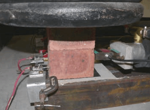 NEW TEST FOR THE SHEAR TRANSFER CAPACITY OF HORIZONTAL SLIP JOINTS IN LOADBEARING MASONRY