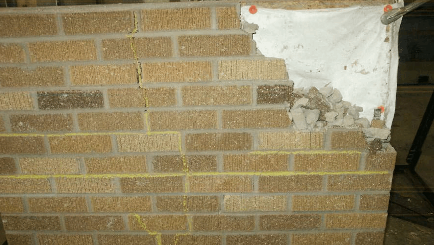 IMPACT RESISTANCE OF BRICK VENEER STRUCTURES TO HURRICANE DEBRIS