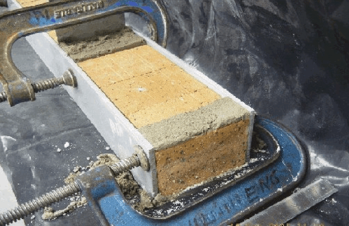 EXPERIMENTAL IDENTIFICATION OF MOISTURE TRANSPORT PARAMETERS FOR  BRICK AND MORTAR