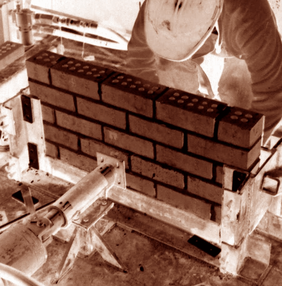 EFFECT OF VENEER JOINT REINFORCEMENT  ON BRICK TIE EMBEDMENT