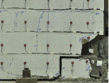 LARGE-SCALE TESTING OF HYBRID MASONRY