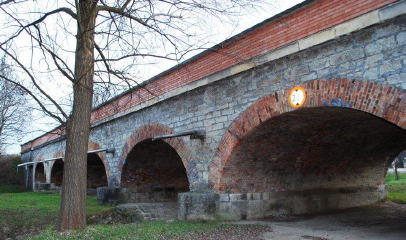 DETERMINATION OF MATERIAL PARAMETERS OF HISTORICAL MASONRY ARCH BRIDGES UNDER VARIOUS LOADING SITUATIONS, EXPERIMENTAL TESTING